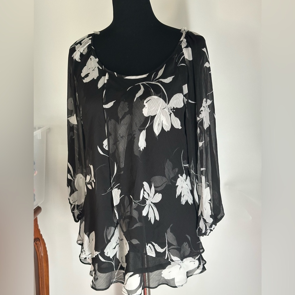 Tamara H. black long sleeve women’s top large